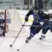 Pioneer senior Anthony Moran handles the puck behind the net in the game against Livonia Stevenson on Tuesday, March 5. Daniel Brenner I AnnArbor.com